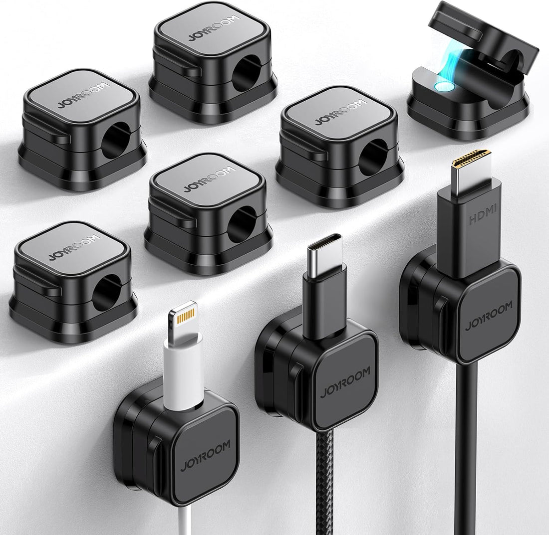 Magnetic cable clips organising cords on a gaming desk