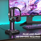 Headset stand in dark room glowing
