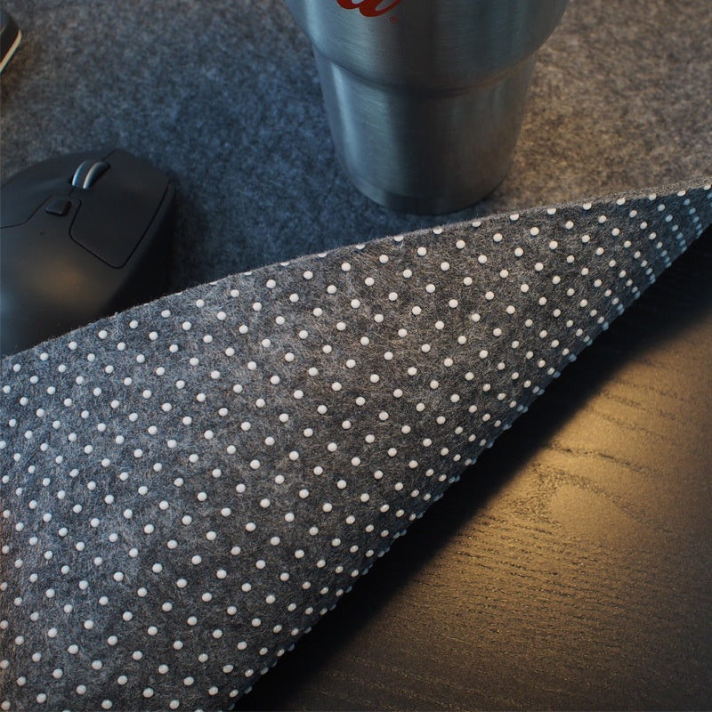 Non-slip felt desk mat with keyboard and mouse